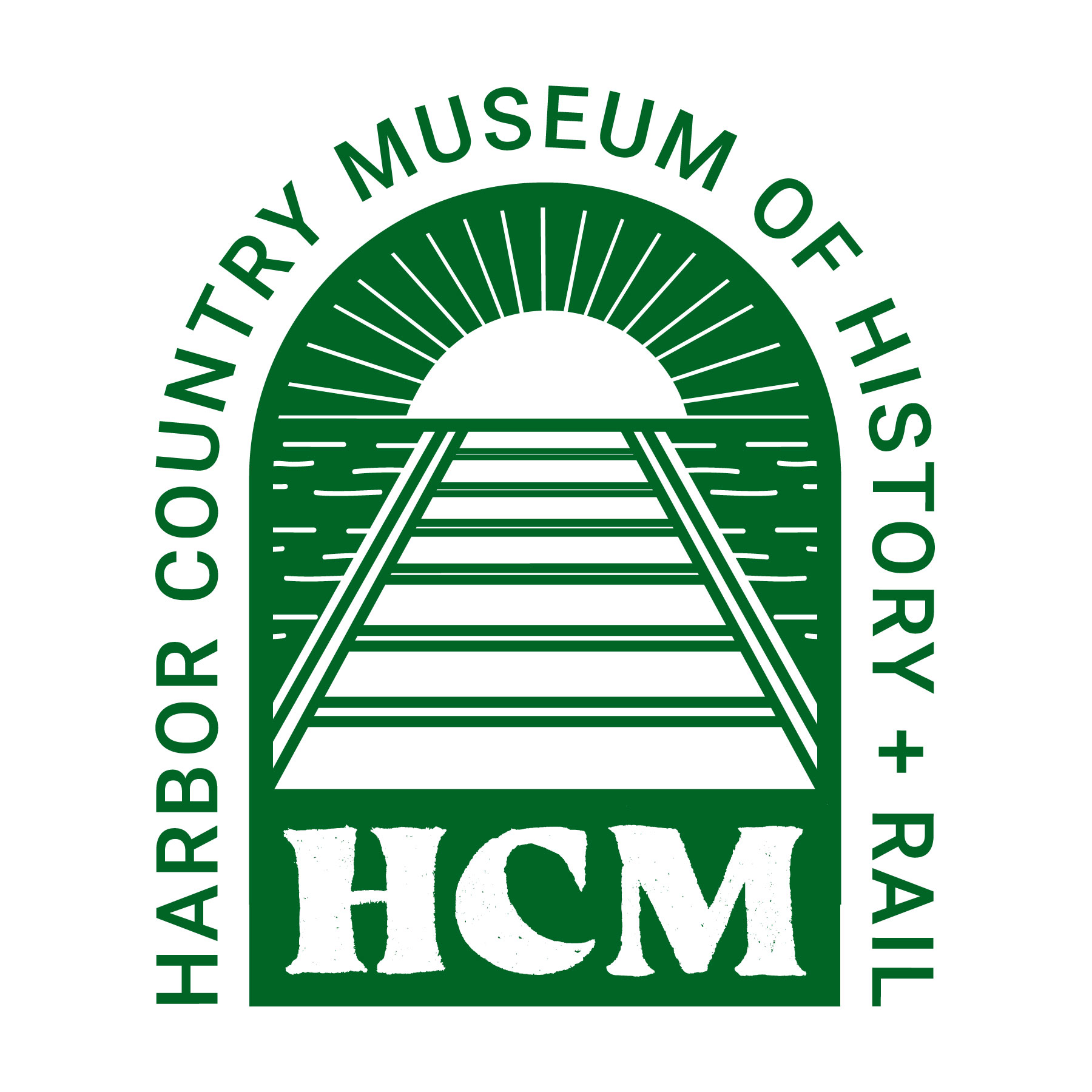 Green arched logo that reads 'harbor country museum of history + rail, HCM'